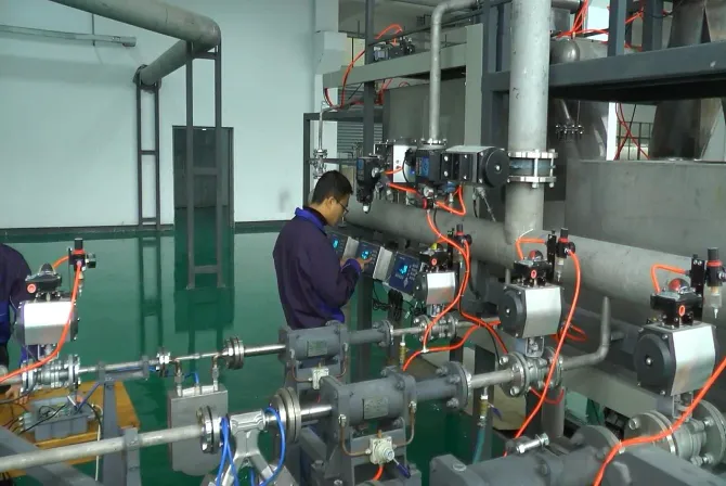 Sealand technician operating instruments on the calibration line