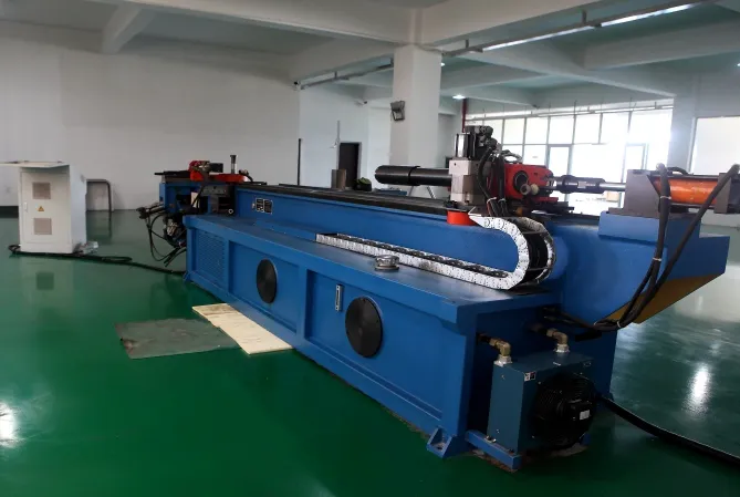 Blue pipe-forming equipment in the Sealand production workshop
